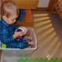 Daniel decided he wanted a morning "bath" in his toy box.